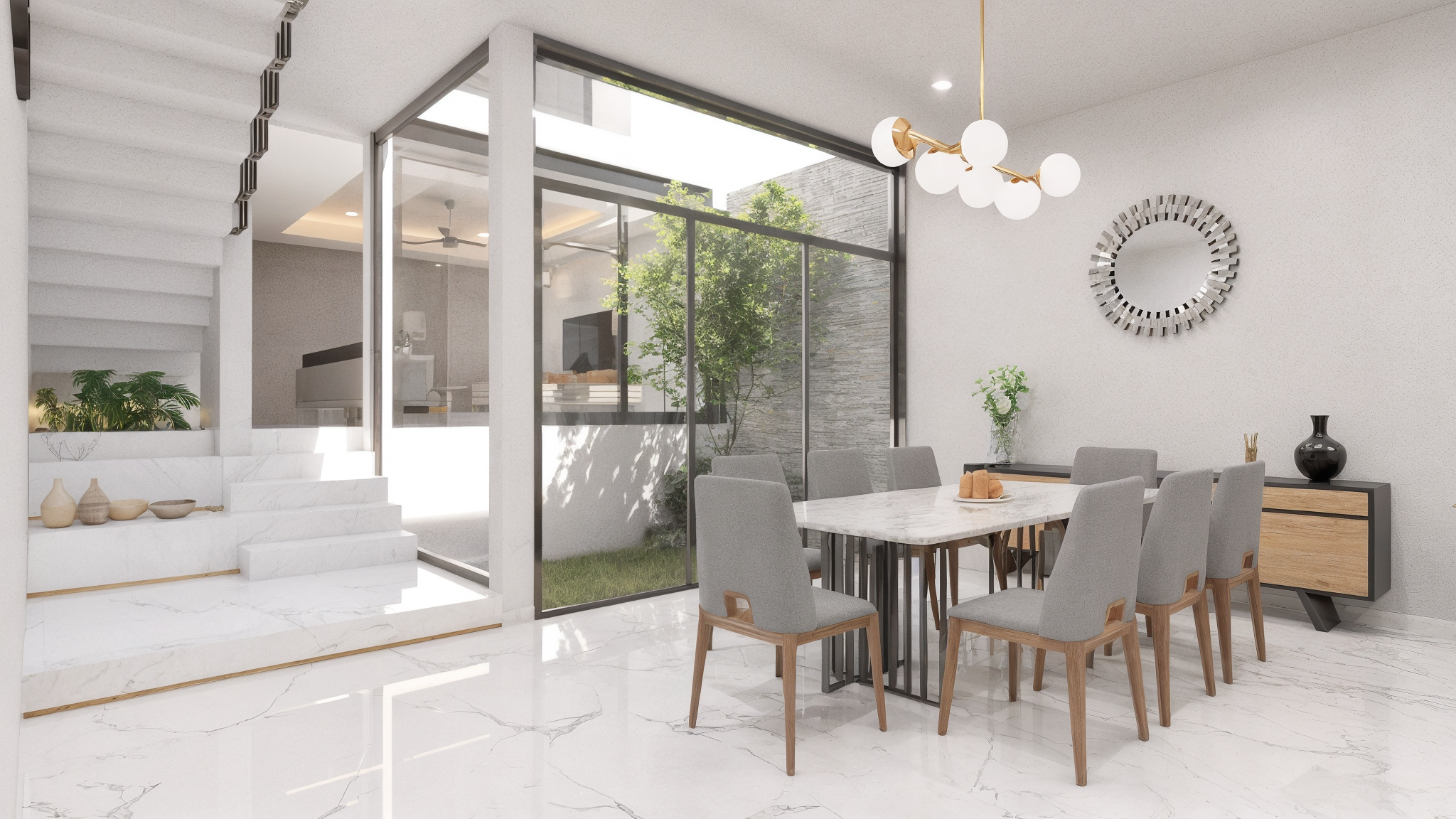 Comedor abierto hacia un jardín interior en Casa Guayabitos